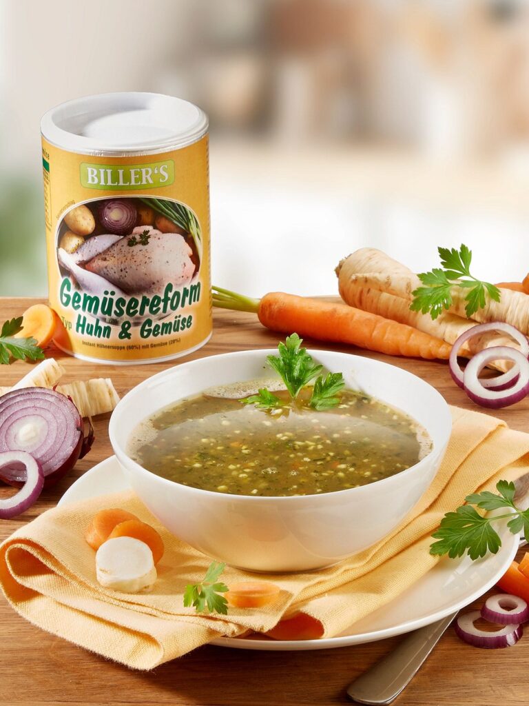Gemüsereform-Suppe Huhn & Gemüse angerichtet und als Dose