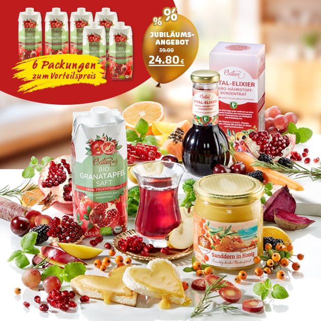 Produktsortiment mit Säften, Honig und Schriftzug „Fit & vital ins neue Jahr“