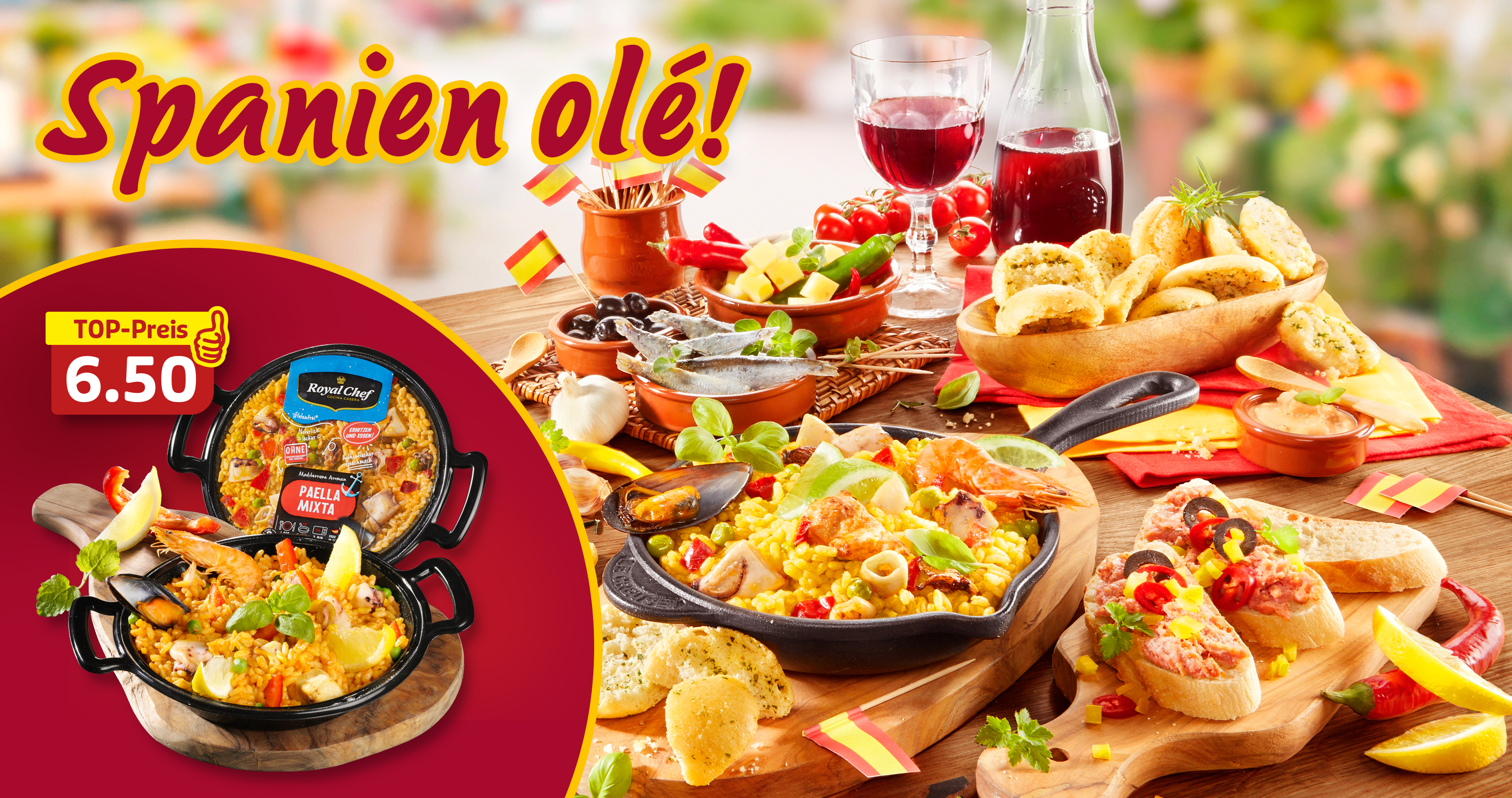 Spanische Spezialitäten mit Paella, Tapas und Wein