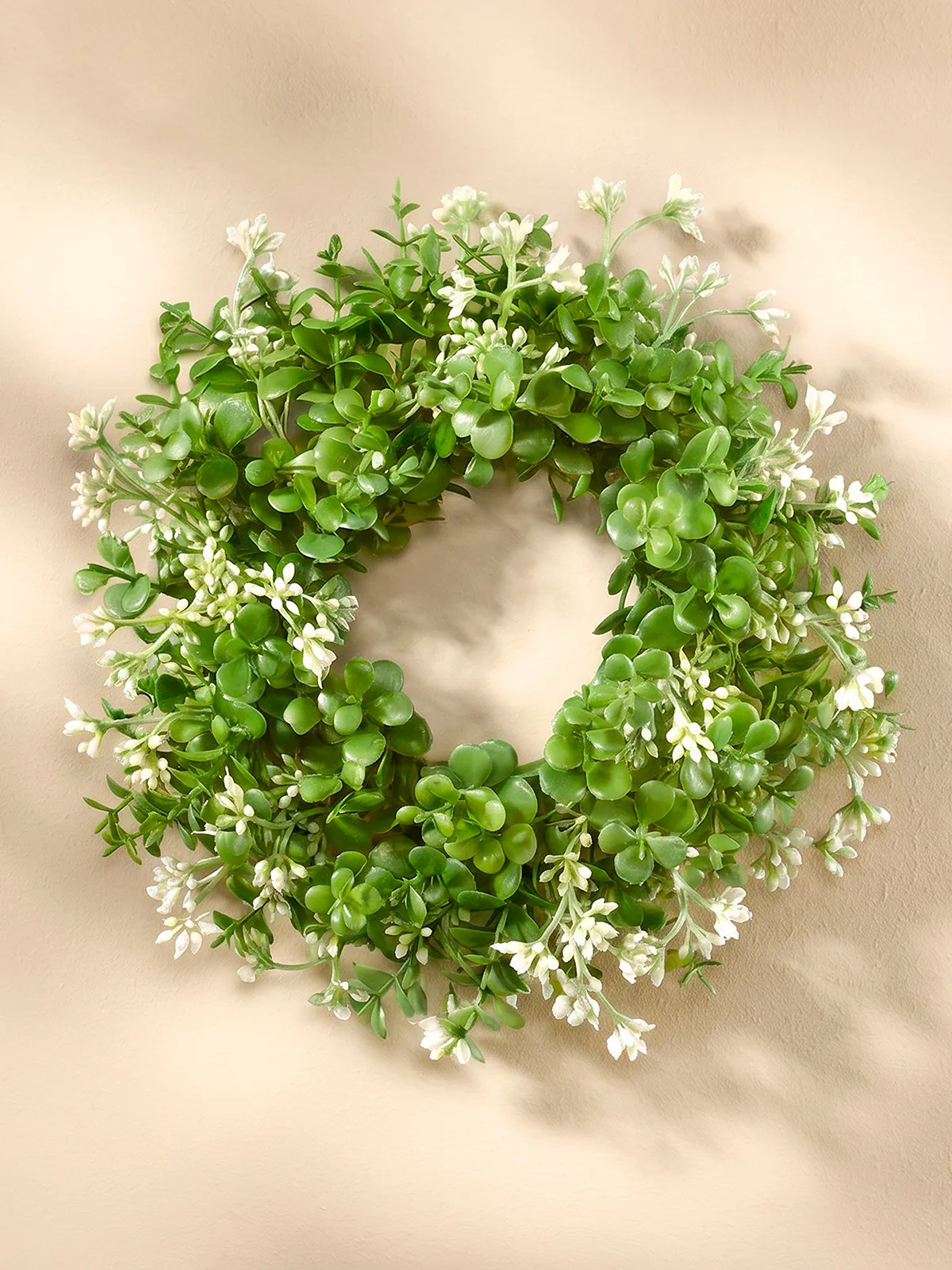 Buchskranz mit Blüten