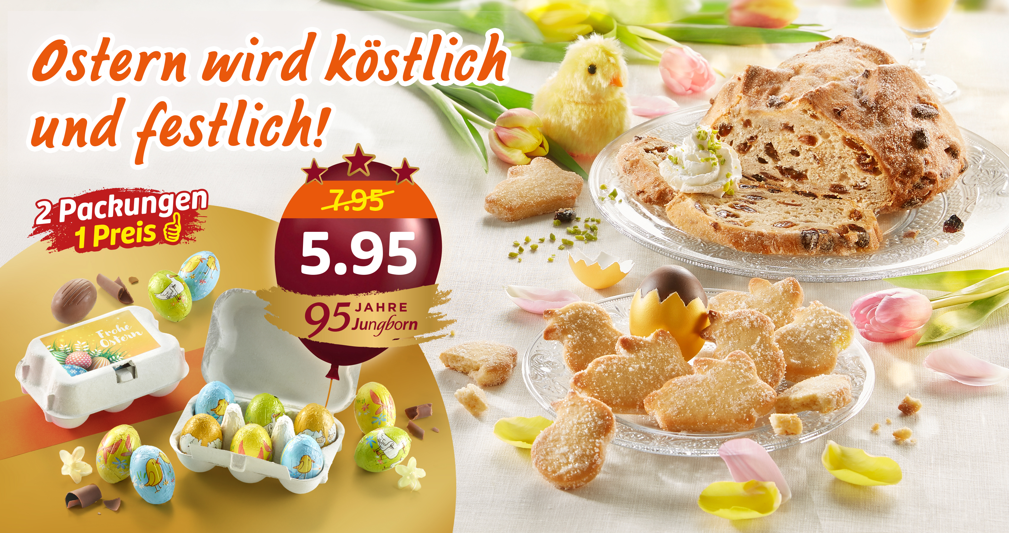 Ostergebäck, Schokoeier und Deko auf festlich gedecktem Tisch