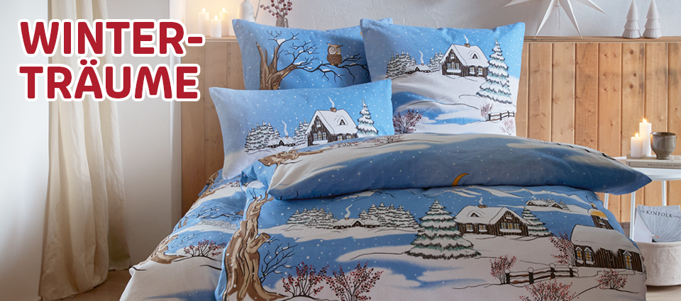 Winterliche Bettwäsche mit verschneiter Landschaft in Blau und Weiß