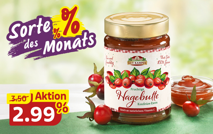 Hagebutten-Konfitüre im Glas mit roten Früchten