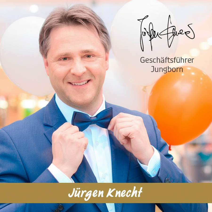 Jürgen Knecht mit Fliege und Ballons zum Jubiläum von Jungborn