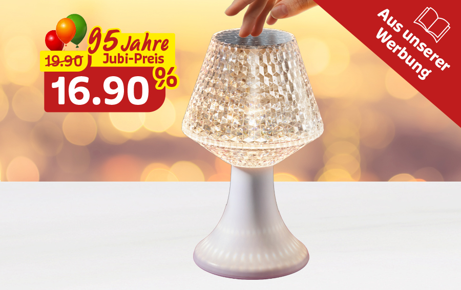 Tischlampe mit Jubiläumspreis und Hinweis aus der Werbung