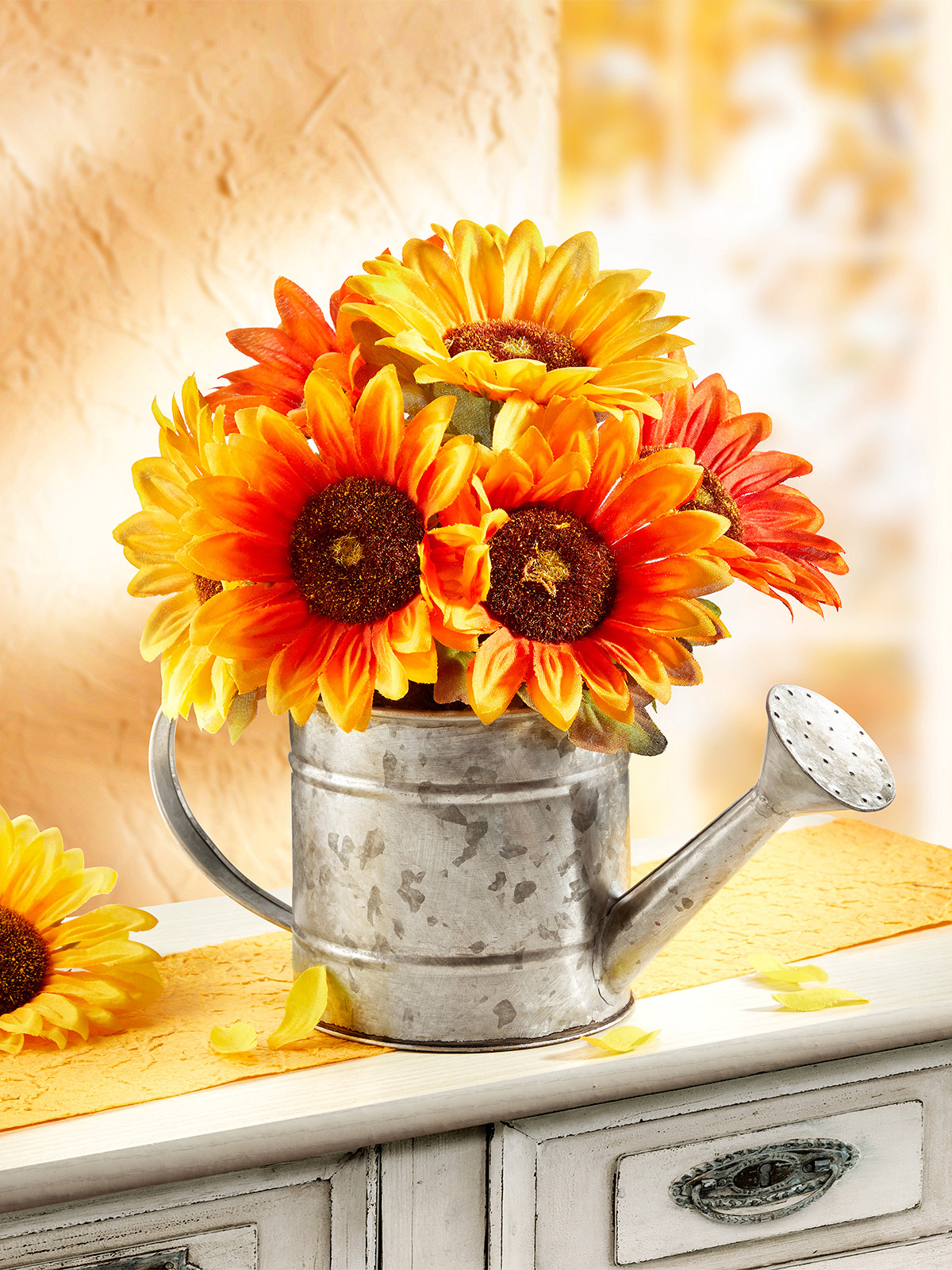 Sonnenblumen im Kännchen