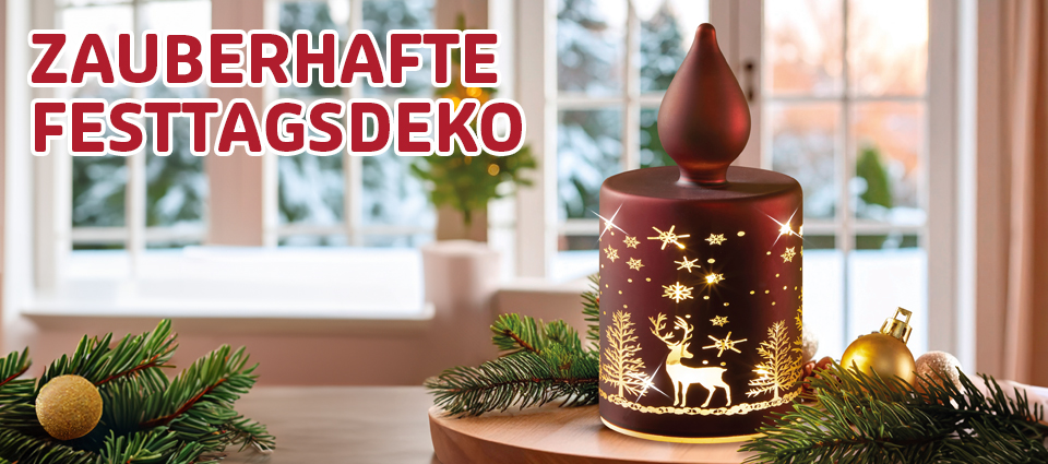Leuchtende Weihnachtsdekoration mit Hirschmotiv und Tannenzweigen