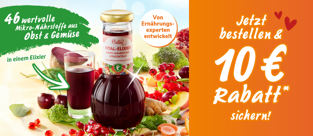 Vital-Elixier-Flasche mit Glas, umgeben von frischem Obst und Gemüse auf hellem Hintergrund.