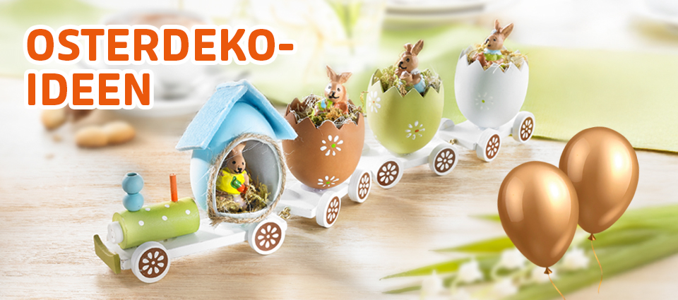 Osterdeko mit Hasenfiguren im Eierzug für frühlingshafte Tischdeko