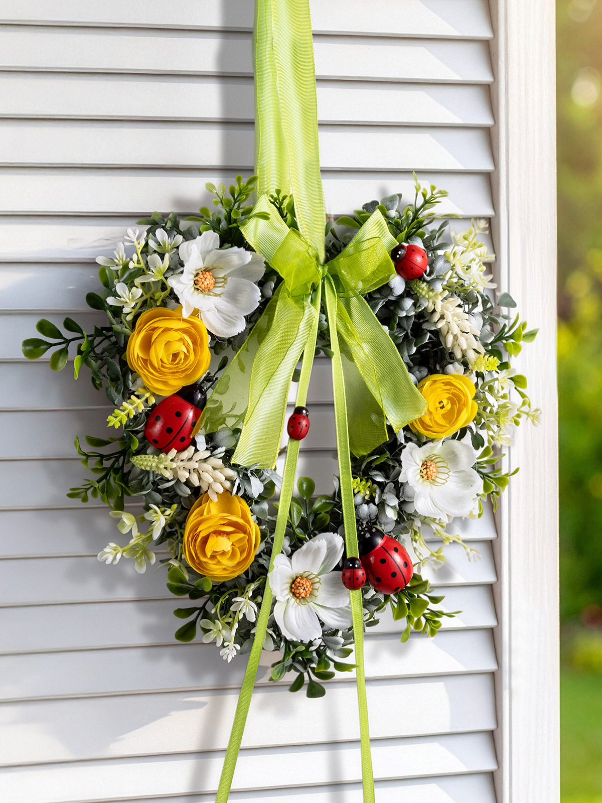 Buchsbaumherz mit Marienkäfer